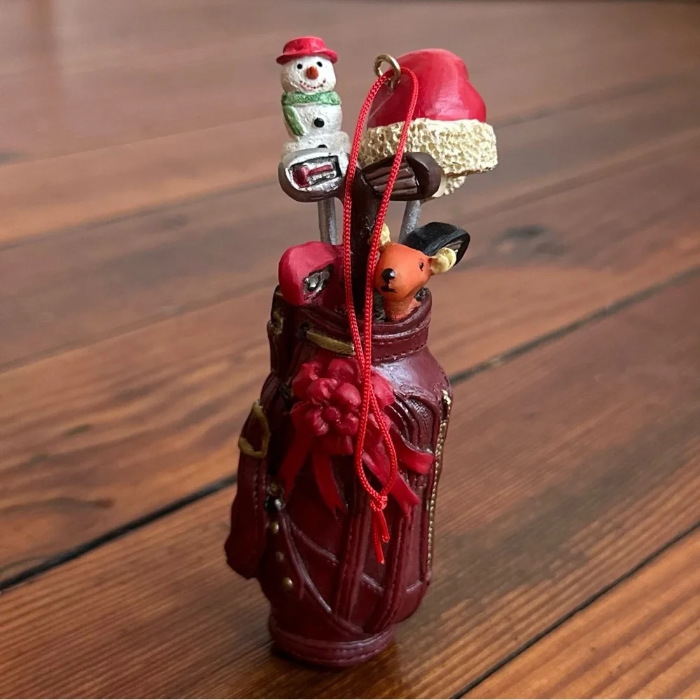 2009 red golf bag ornament w Santa hat, snowman, & clubs